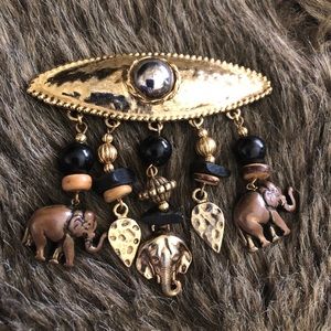 Vintage 80s hammered gold tone safari brooch pin